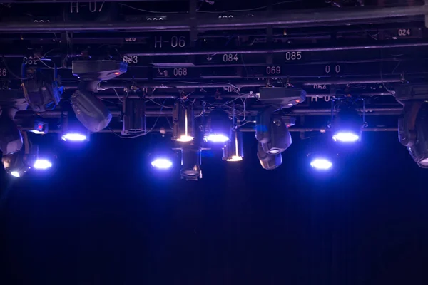 Lighting equipment and hanging bars for performances within the theater are bright for use.
