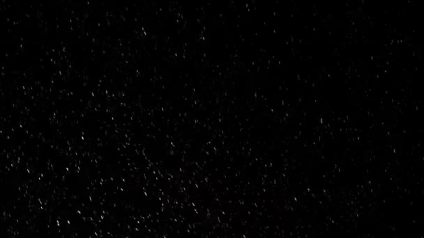 4k ralenti Golden pailleté tempête de neige de Noël VFX. Tempête de neige sur écran noir. Neige épaisse sur noir. Élément d'insertion VFX Noël. Couches de neige dorées brillantes en profondeur . 