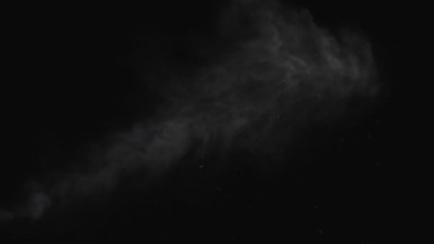 Une balle poussiéreuse a frappé un mur avec des morceaux de débris qui s'envolaient. Explosion de poudre blanche sur fond noir.Impact particules de poussière. Explosion de poussière devant fond noir, ralenti, élément vfx .