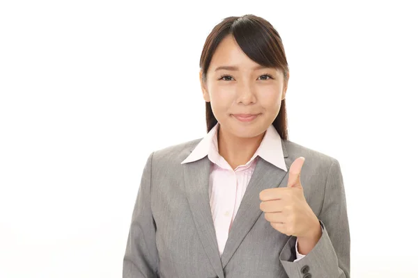親指と笑みを浮かべて女性実業家 — ストック写真
