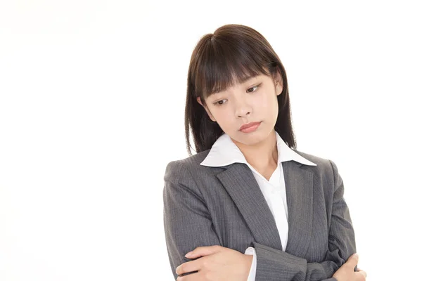 Uneasy Asian Business Woman — Stock Photo, Image