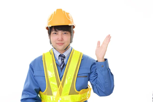 Asian Worker Shows Way — Stock Photo, Image