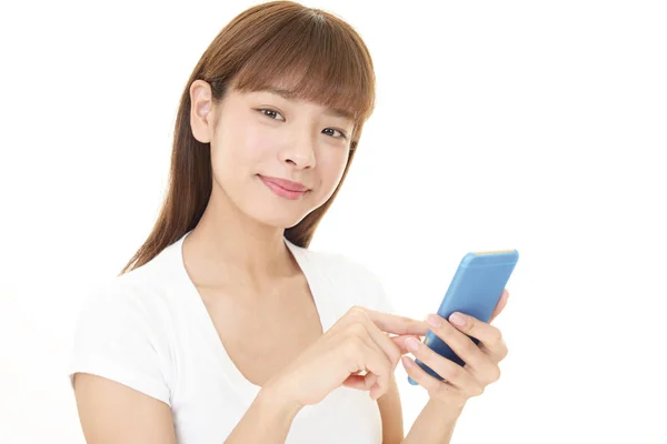 Smiling Woman Using Smart Phone — Stock Photo, Image