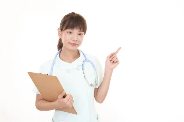 Giovane Infermiera Femminile Che Indica — Foto Stock