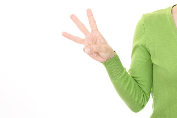 Woman hand gesturing number three