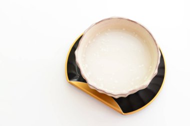 Amazake. Fermente pirinç yapılmış bir tatlı içeceği.