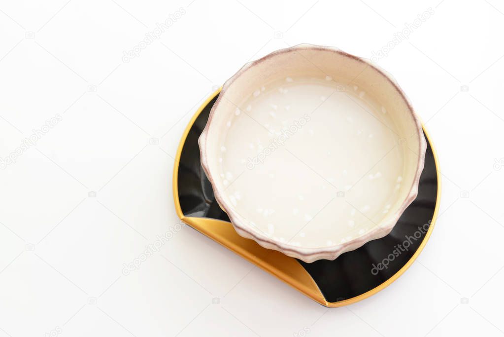 Amazake. It's a sweet drink made from fermented rice.