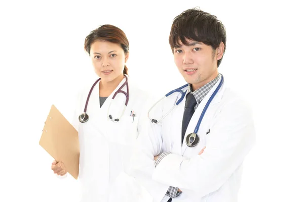 Sonriendo Médicos Asiáticos — Foto de Stock