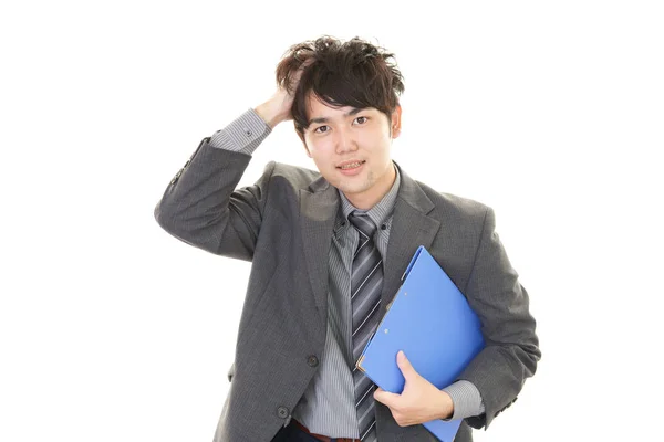 白い背景上に分離されて不満のアジア系のビジネスマン — ストック写真