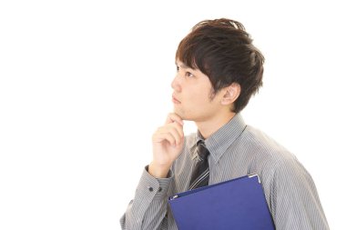 Huzursuz görünen bir iş adamı portresi