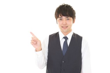 İşadamı parmağıyla işaret ediyor.