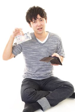 Beyaz arka plan üzerinde izole para ile hayal kırıklığına Asyalı adam