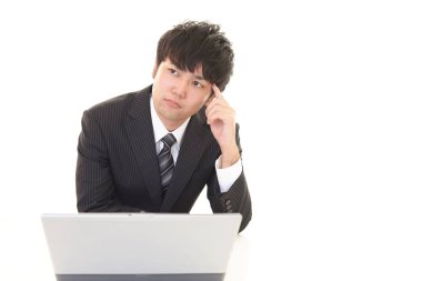 yorgun ve stresli Asya iş adamı