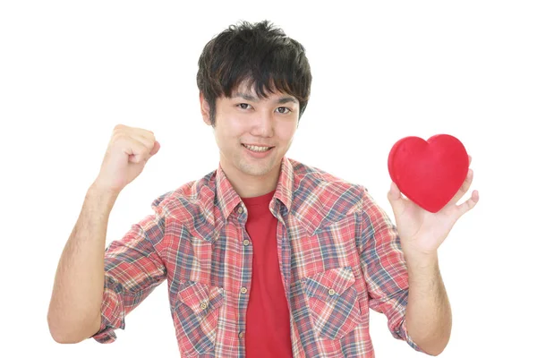Sorrindo Homem Segurando Símbolo Amor Coração Vermelho — Fotografia de Stock