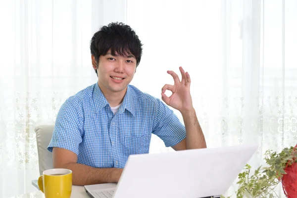 Man who enjoy the laptop computer