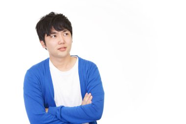 Kolları bağlı Asyalı bir adam.