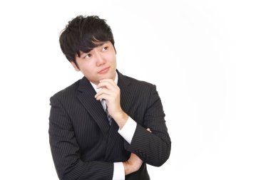 Huzursuz görünen bir iş adamı portresi