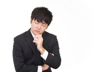 Huzursuz görünen bir iş adamı portresi