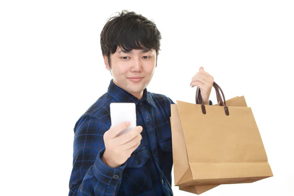 Hombre Sonriente Con Bolsas Compras —  Fotos de Stock