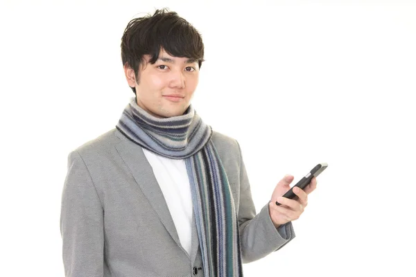 Hombre Asiático Sosteniendo Teléfono Inteligente — Foto de Stock
