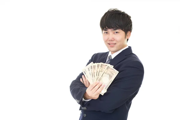 Улыбающийся Азиатский Бизнесмен Деньгами — стоковое фото