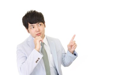 Huzursuz görünen bir iş adamı portresi