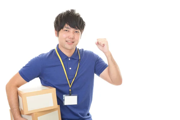 Sorrindo Homem Entrega Com Pacotes — Fotografia de Stock