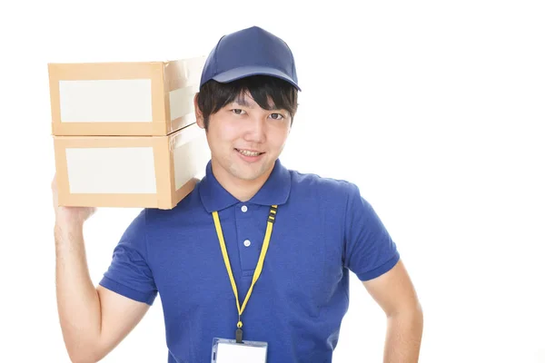 Sorrindo Homem Entrega Com Pacotes — Fotografia de Stock