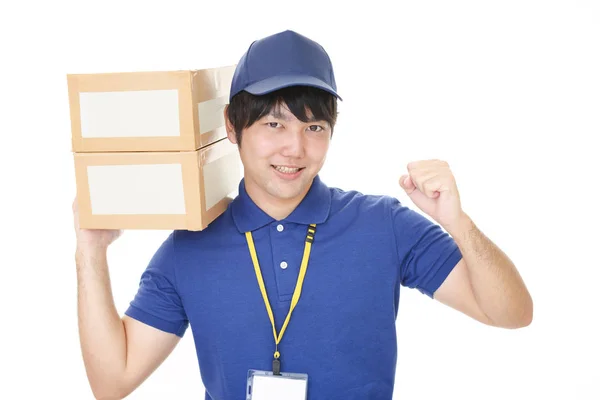 Sorrindo Homem Entrega Com Pacotes — Fotografia de Stock