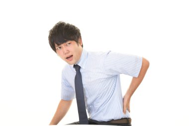 Sırt ağrısı olan işadamı