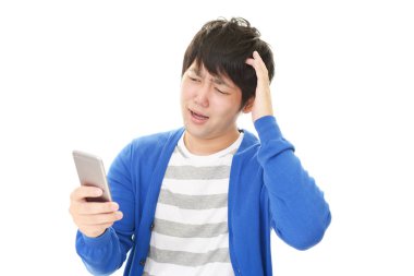 Bir akıllı telefon ile sinirli Asya işadamı