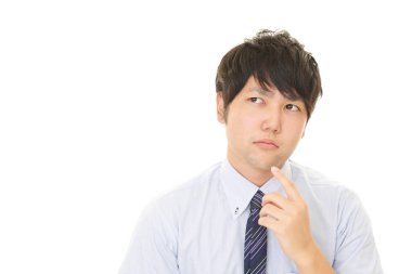 Huzursuz görünen bir iş adamı portresi