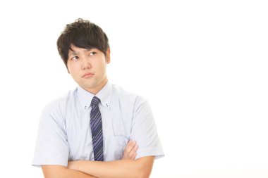 Beyaz arka plan üzerinde izole memnun Asya iş adamı