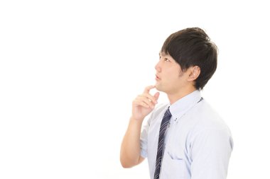 Huzursuz görünen bir iş adamı portresi