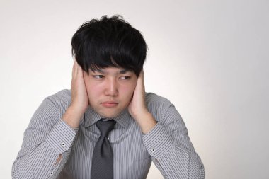 Asya işadamı yorgun ve stresli hissediyor