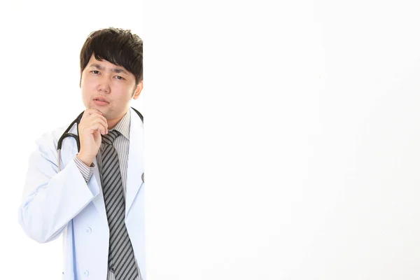 Worried Asian Doctor Whiteboard — Stock Photo, Image