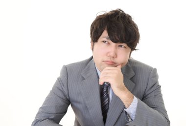 yorgun ve stresli Asya iş adamı