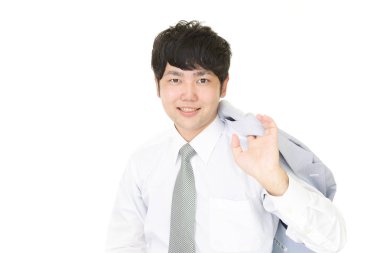 Gülümseyen Asyalı işadamı beyaz arka planda izole edilmiş