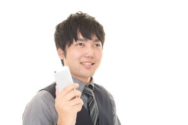 İş adamı cep telefonu kullanıyor