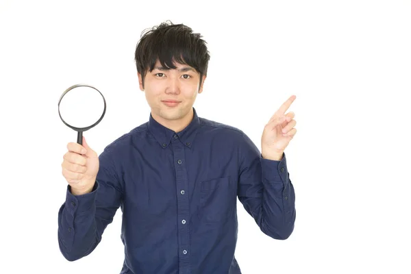 Hombre Sosteniendo Una Lupa — Foto de Stock