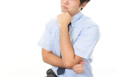 Huzursuz görünen bir iş adamı portresi