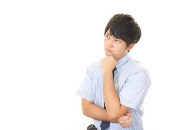 Huzursuz görünen bir iş adamı portresi