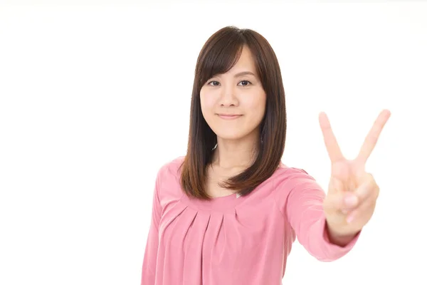 Smiling Asian Woman Gives Sign — Stock Photo, Image