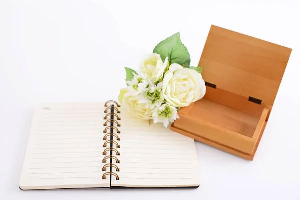 Ring binder book with flowers on the desk