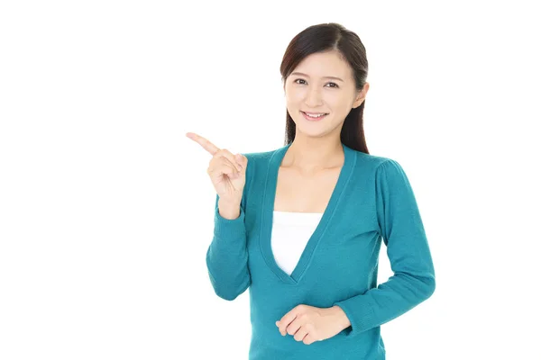 Vrouw Wijzend Met Haar Vinger — Stockfoto