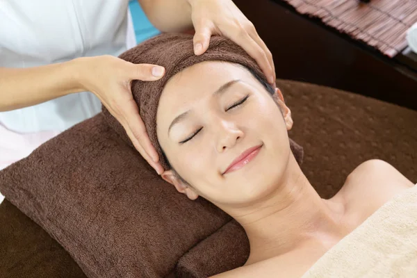 Beautiful Young Woman Receiving Facial Massage Closed Eyes Spa Salon — Stock Photo, Image