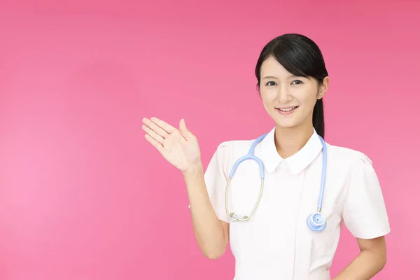 Smiling Female Nurse Isolated Pink Background — Stock Photo, Image