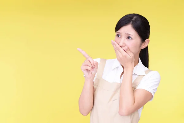 Portrait of woman with shocked facial expression