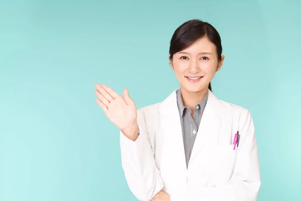 Asian Pharmacist Shows Way — Stock Photo, Image