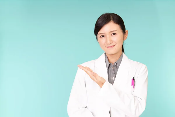 Asian Pharmacist Shows Way — Stock Photo, Image